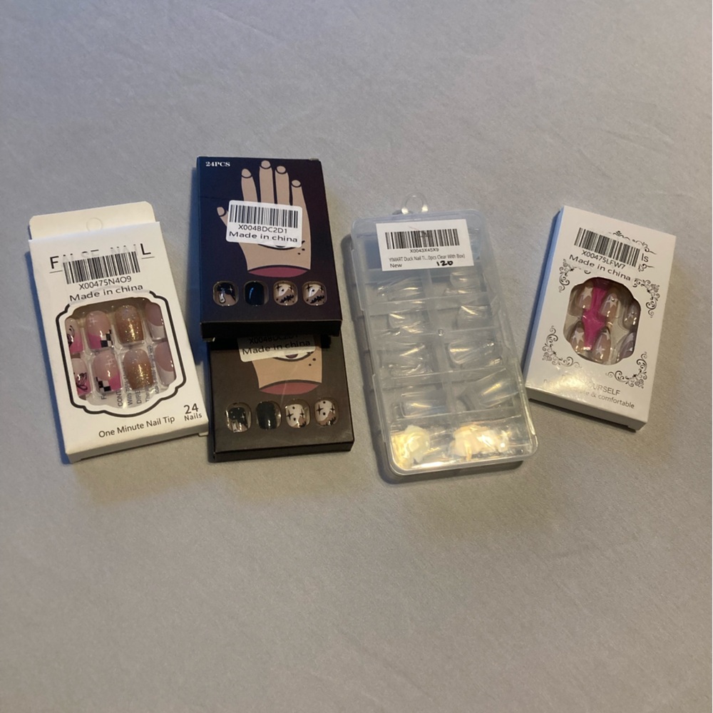 Lot of press on nails and nail tips